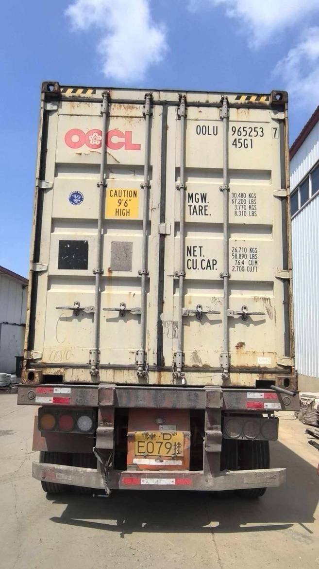 Shipping container with both rear doors closed at the VESTA dispatch site after loading