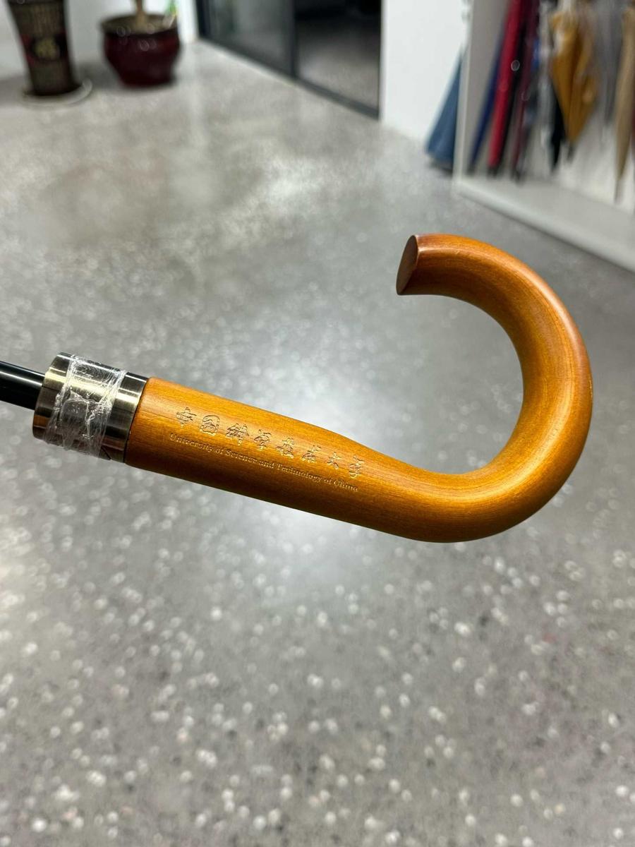 Curved handle with the University of Science and Technology of China name